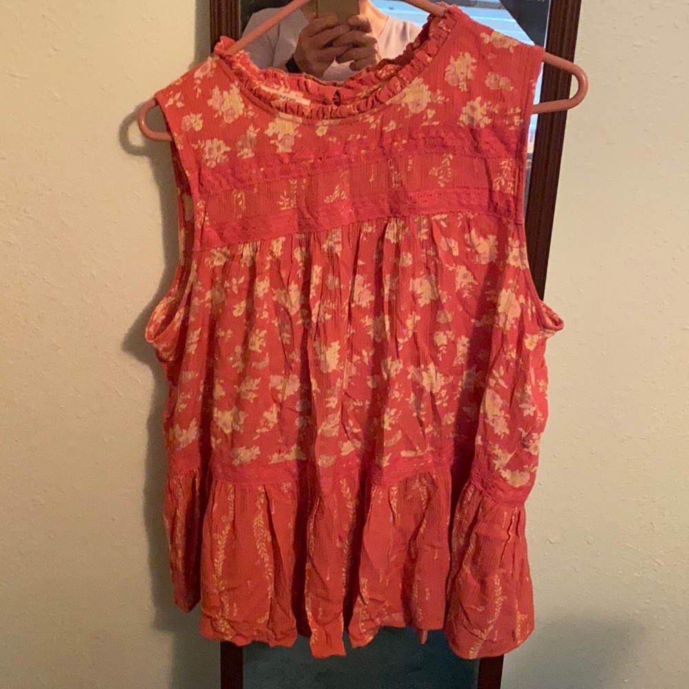 Baby doll tank. Beautiful. Brand new. Never worn.  Coral in color.